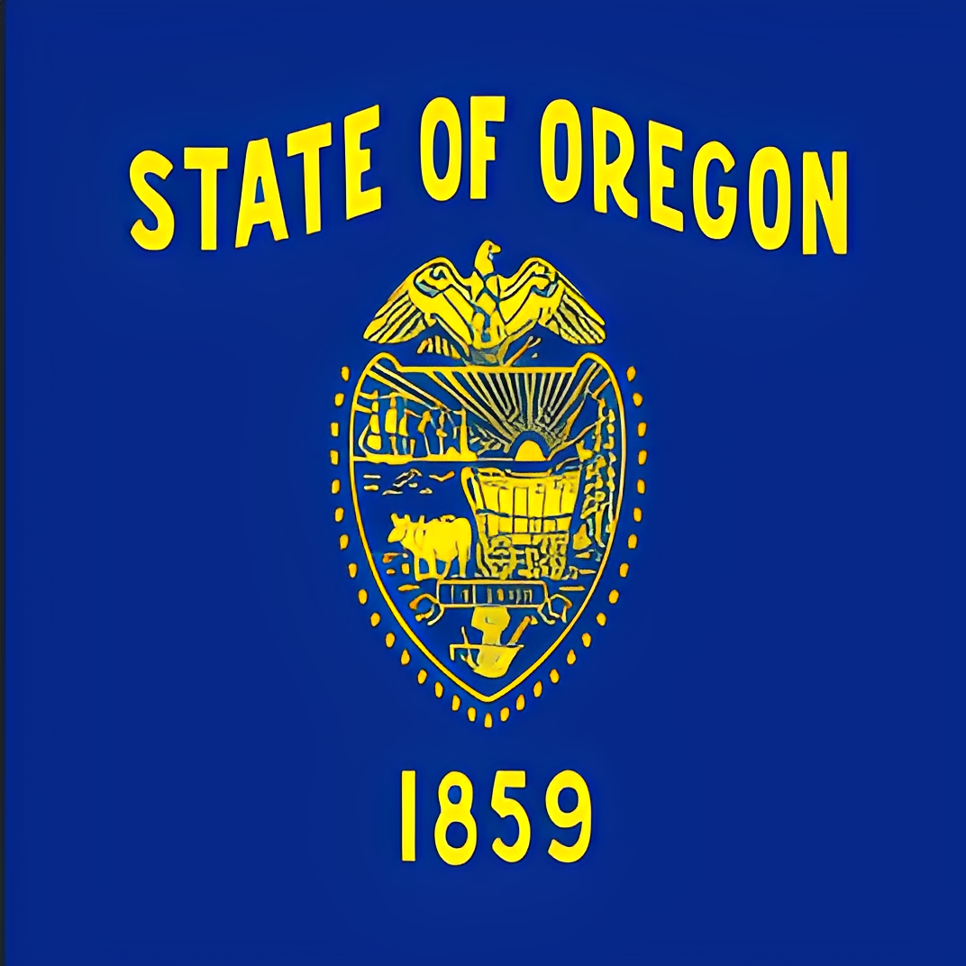 Blue Oregon state flag with yellow seal
