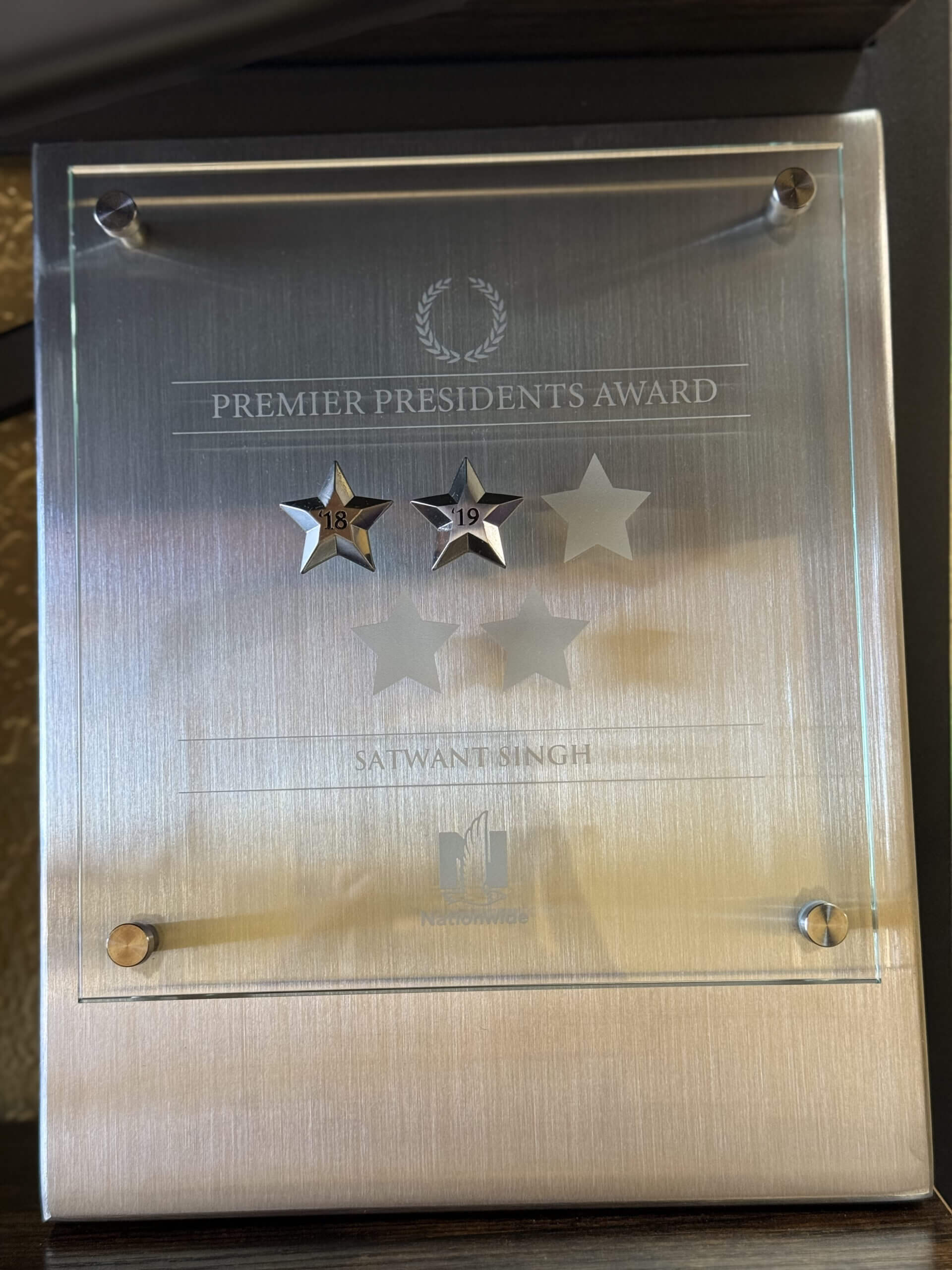 Award plaque with two silver stars