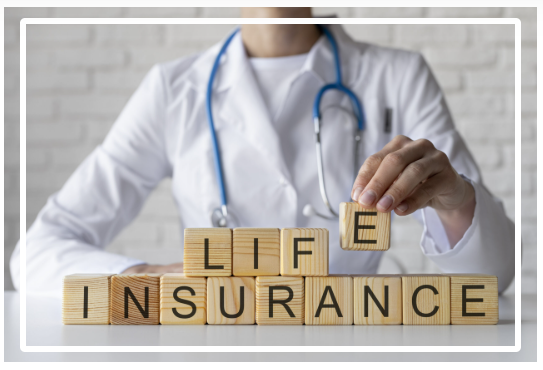 Doctor arranging life insurance wooden blocks